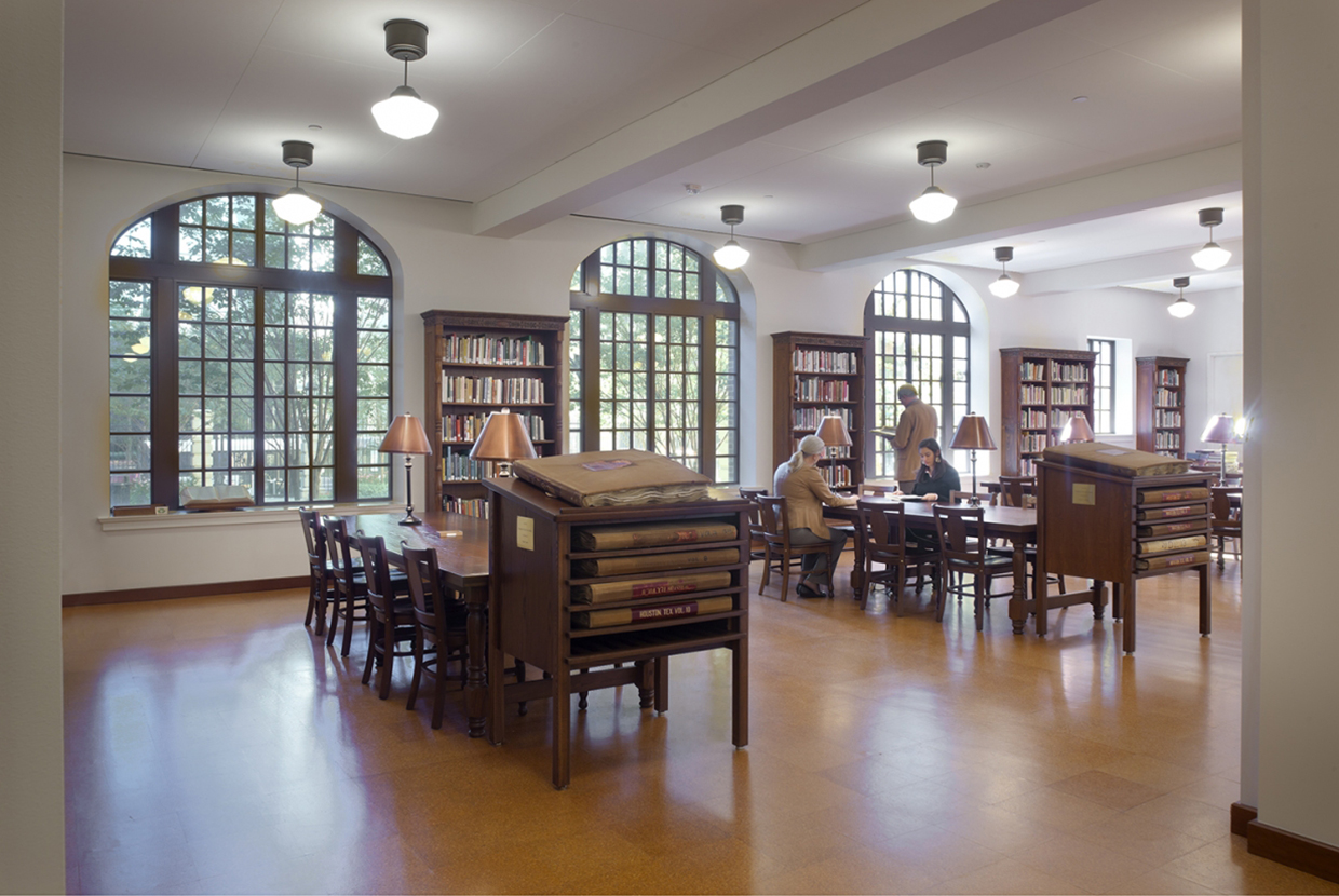School Haus pendants add timeless appeal to a classic library lighting design. 