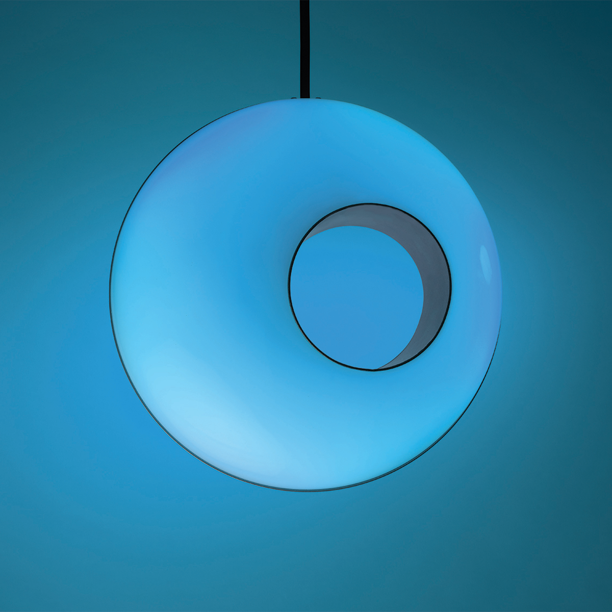 RGB globe pendant light shown in Blue. 