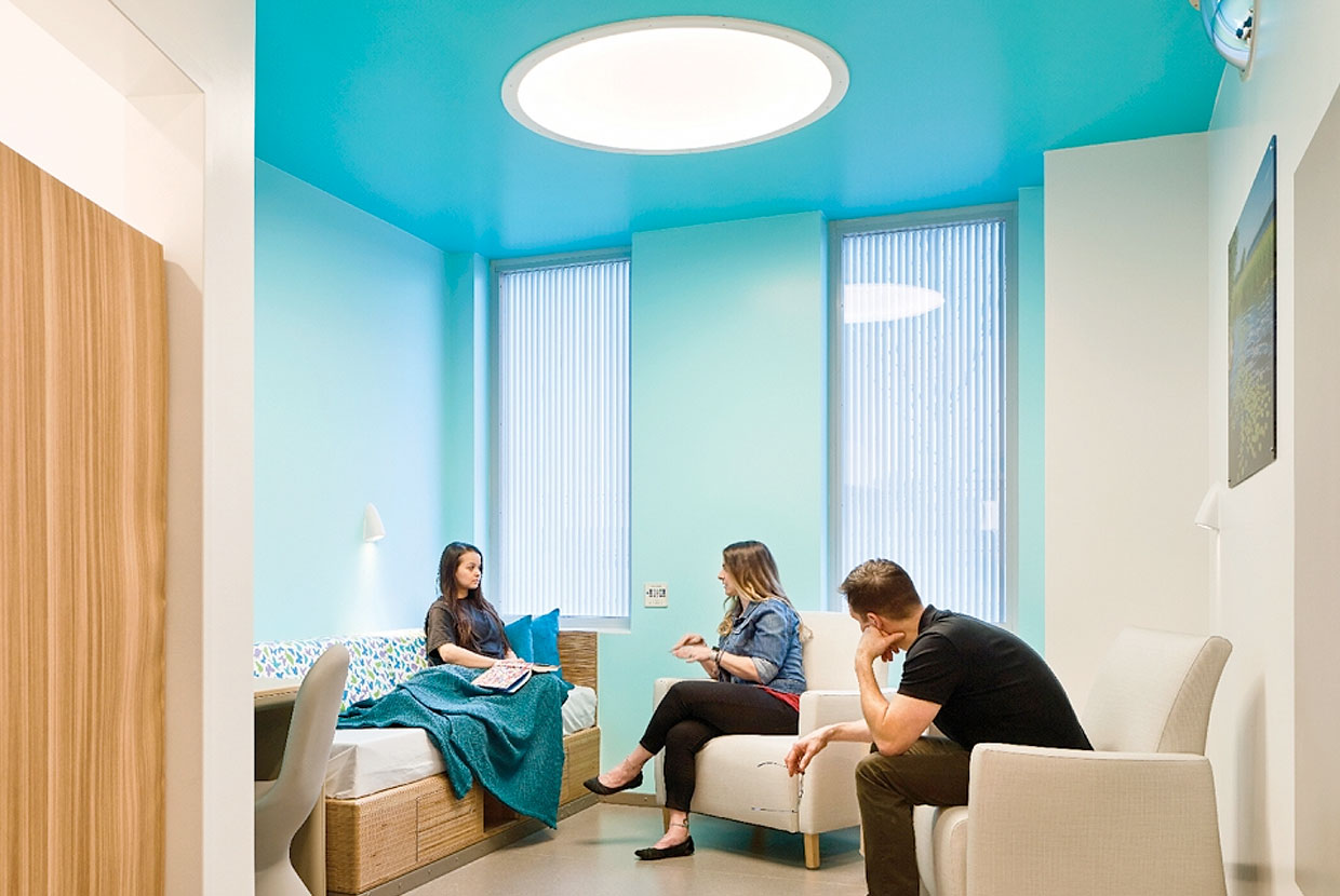 Symmetry circular behavioral health ceiling fixture by Visa Lighting