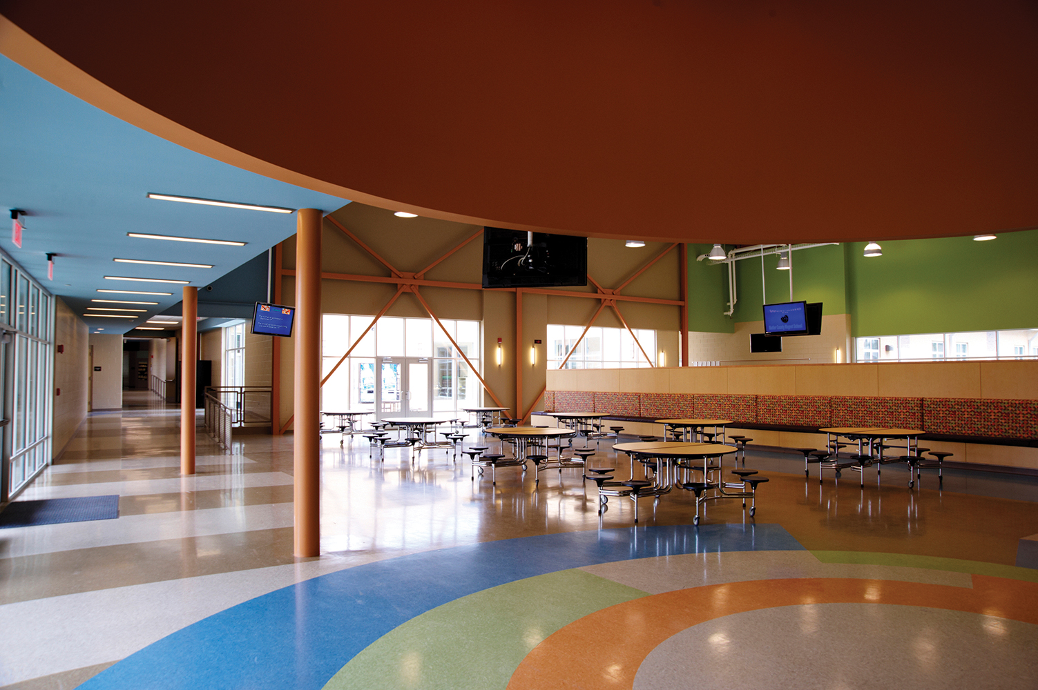 Visage is good supplementary classroom lighting, shown here in ceiling mount configuration above a school cafeteria.